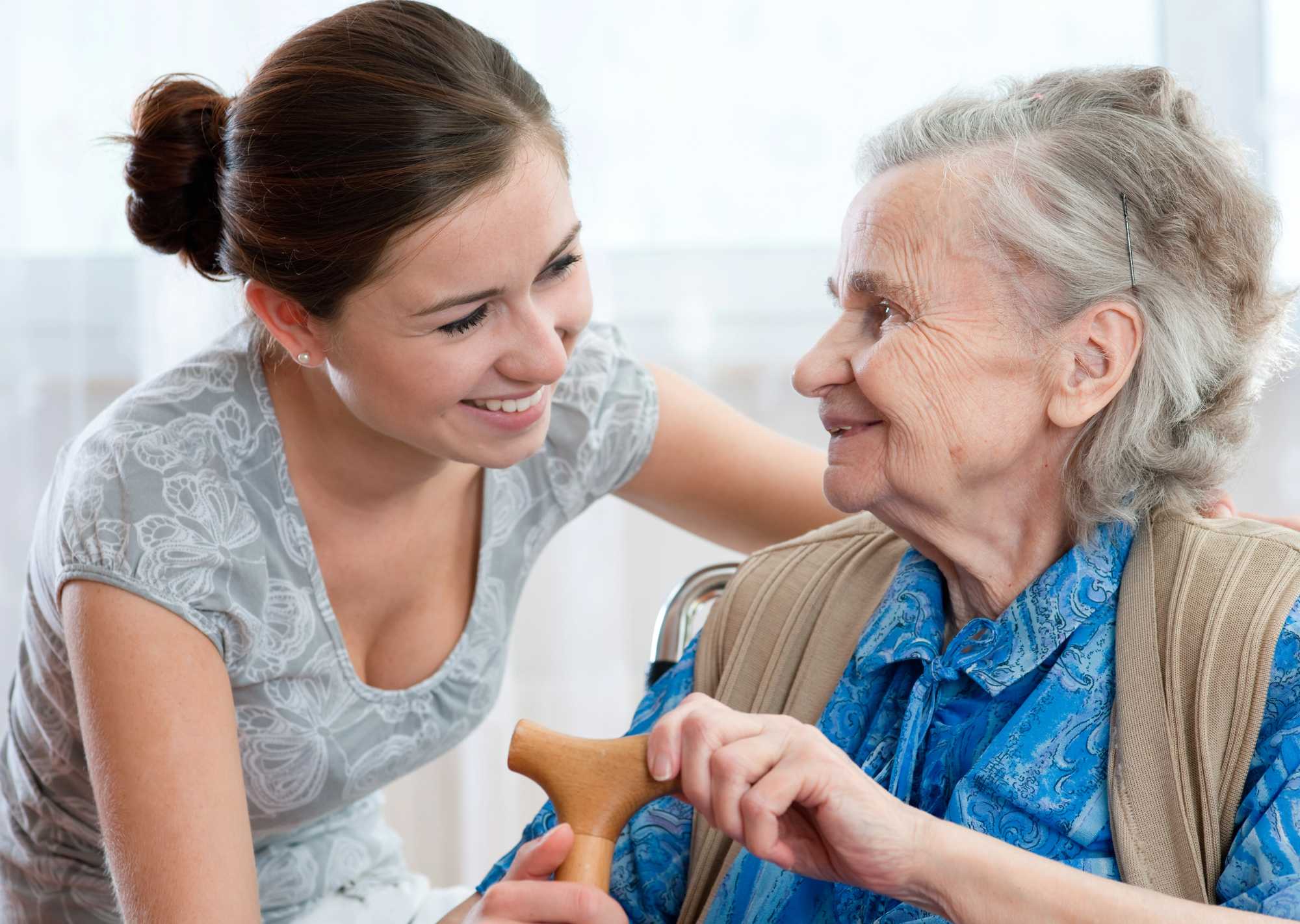 senior woman resident and caregiver